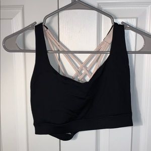 Black and pale pink sports bra